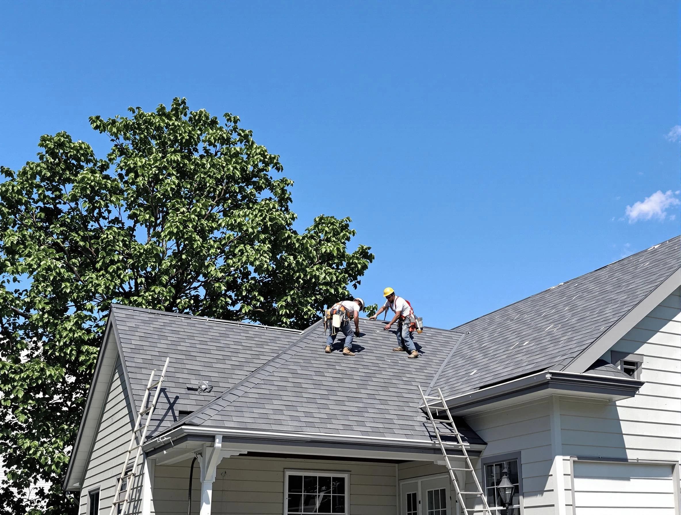 Cleveland Heights Roofing Company crew finalizing a roof installation in Cleveland Heights, OH