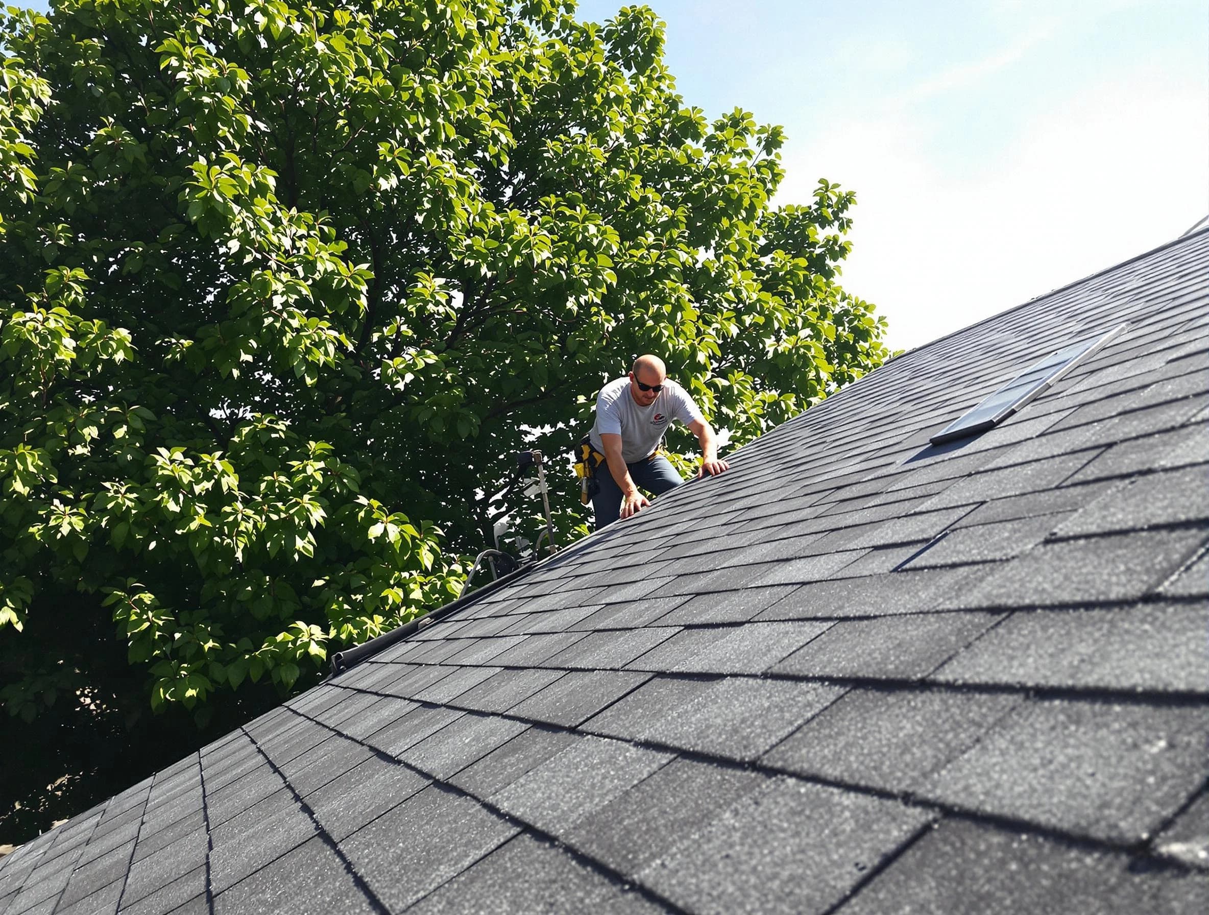 Certified roofers from Cleveland Heights Roofing Company working in Cleveland Heights, OH